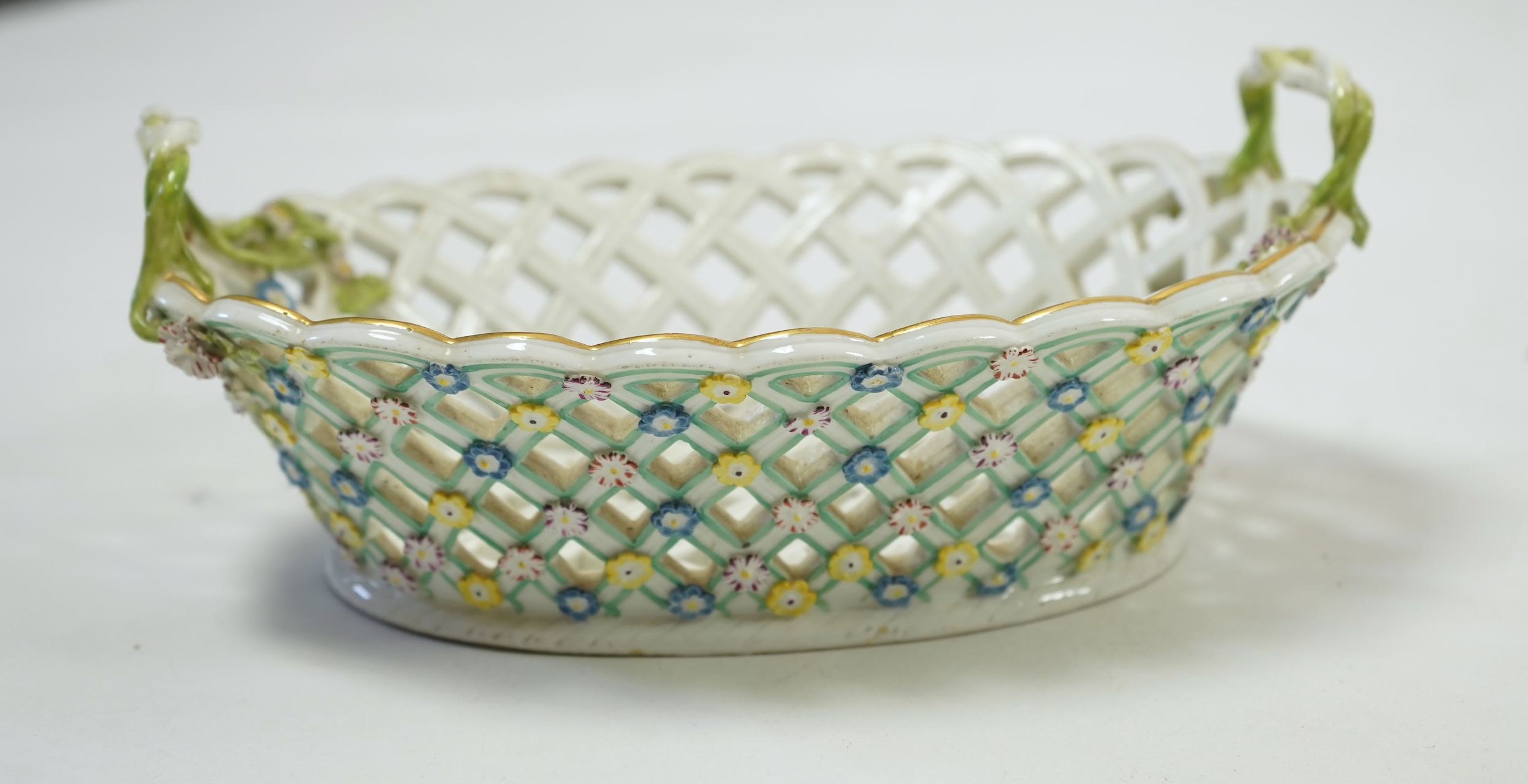 A pair of mid 18th century Meissen porcelain reticulated baskets c.1765